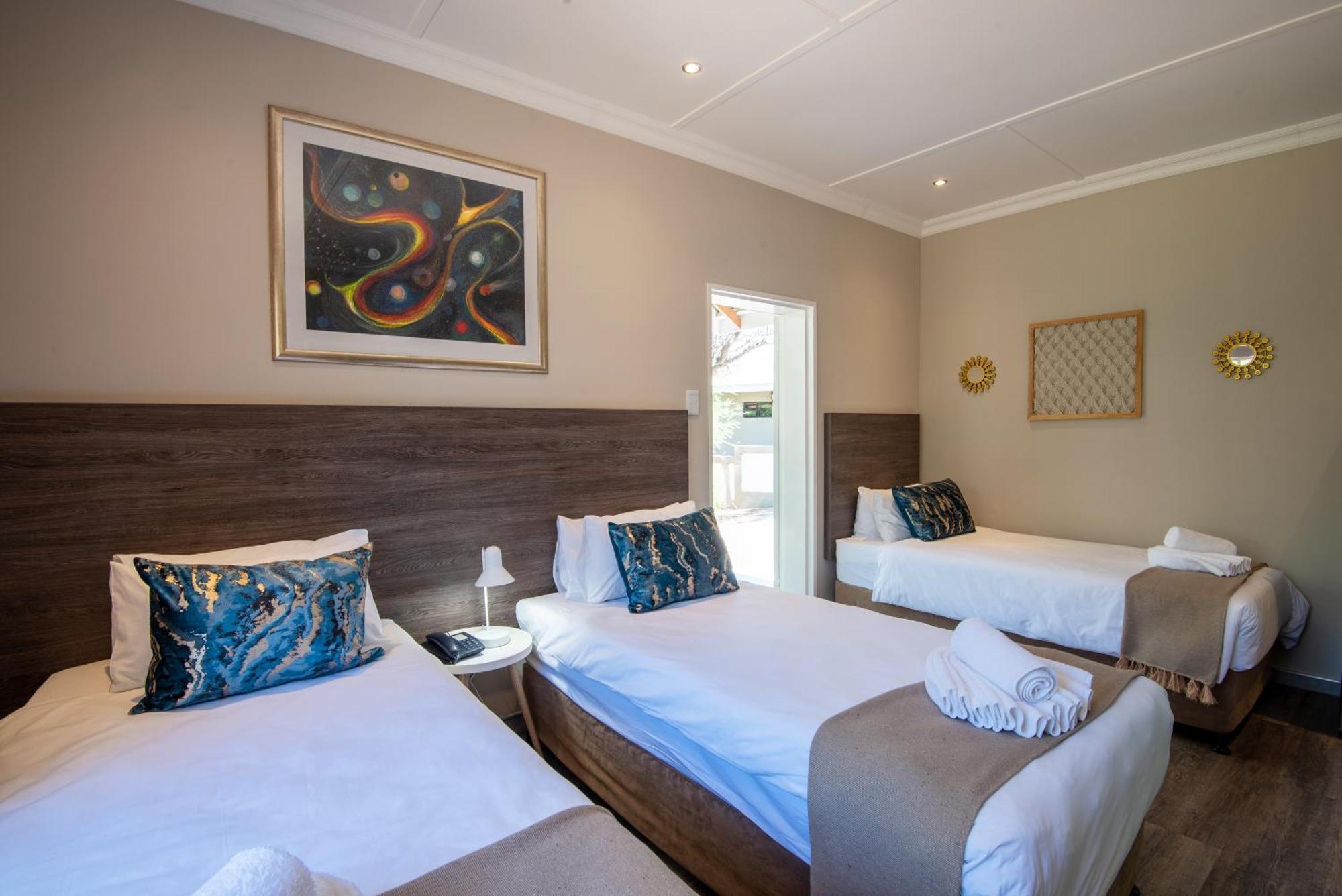 Arebbusch Travel Lodge Windhoek Zimmer foto